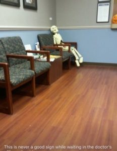 Healthcare Facility Waiting Room With Picture of Skeleton in Chair