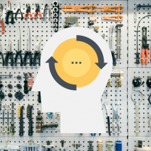 Shows a pegboard wall full of well organized tools. In front of it is a profile of a man with arrows pointing around a circle indicating his way of thinking is being transformed... ie. cultural transformation