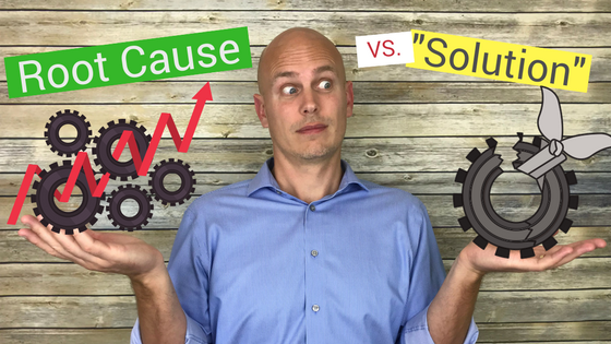 Tom holds a set of nicely fixed parts in one hand to demonstrate that the root cause of that problem had been found and addressed. In the other hand he holds a broken part with a bandage on it, demonstrating how putting a "bandage" on the problem is not nearly as productive as identifying the root cause and fixing the problem properly.