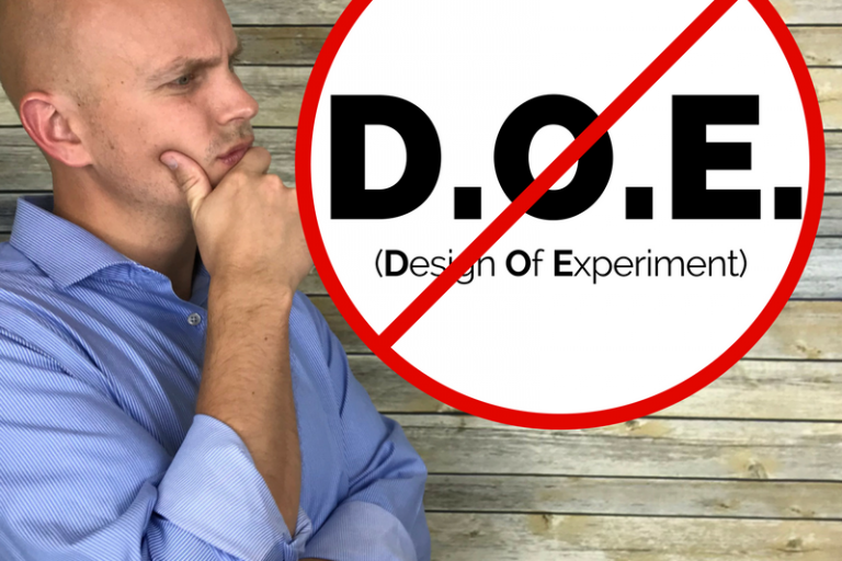 The letters DOE Design Of Experiment are in a circle with a line through it, and Tom is to the left contemplating when NOT to use a D.O.E.